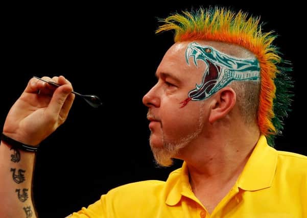 Scotland's Peter Wright will go for the PDC world title tomorrow. Picture: Getty