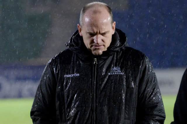 Glasgow Warriors Head Coach Gregor Townsend trudges off the Scotstoun field after the game is called off. Picture: SNS