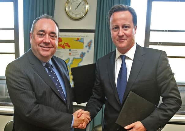 Alex Salmond and David Cameron at the signing of the Edinburgh Agreement in 2012. Picture: Getty