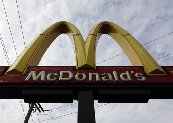 File photo of a McDonald's sign. 'Miscommunication' led to the OAPs being fed chicken from the fast food chain. Picture: AP