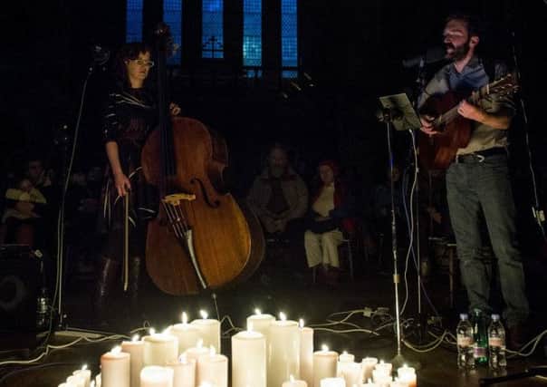 Candles illuminated the New:found:land performance at Old St Pauls Church. Picture: Ian Georgeson
