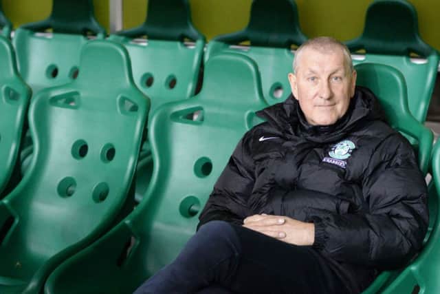 Terry Butcher looks relaxed as he poses for photographers before the game. Picture: SNS