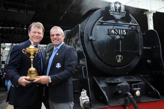 Ryder Cup captains Tom Watson and Paul McGinley show off the trophy. Picture: Jane Barlow
