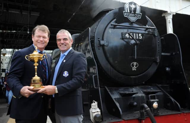 Ryder Cup captains Tom Watson and Paul McGinley show off the trophy. Picture: Jane Barlow