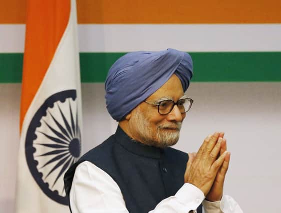 Manmohan Singh announces his decision to stand down yesterday. Picture: AP