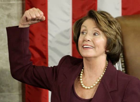 Nancy Pelosi flexes her muscles after being elected the first female Speaker in the US House of Representatives in 2007. Picture: Getty