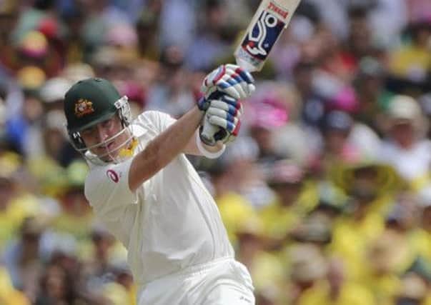 Brad Haddin unleashes a drive as he played the role of Englands Ashes nemesis again. Picture: AP