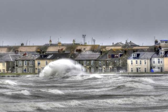 Stormy seas at Troon in Ayrshire yesterday as gales battered the West of Scotland. Picture: TSPL