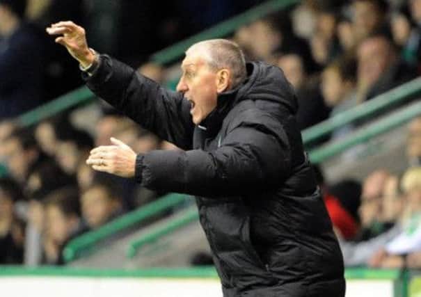 Terry Butcher sends a message to his players during the Edinburgh derby. Picture: Jane Barlow