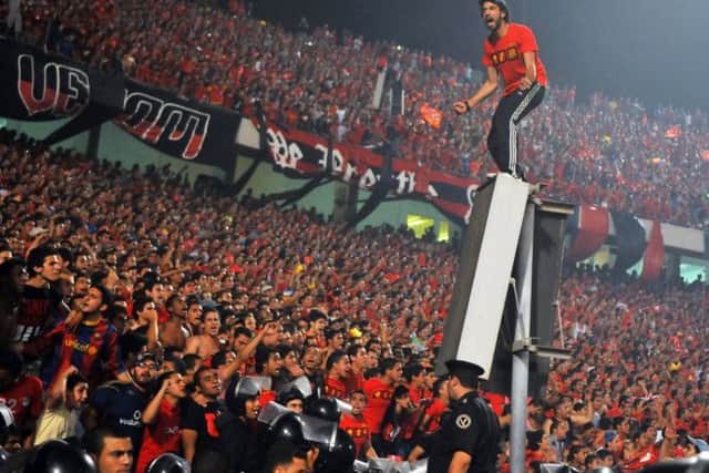 High emotion: Mahmoud Hassan made his debut in the frenzied atmosphere of a Cairo derby so is unlikely to be fazed by joining one of the Old Firm. Picture: Getty