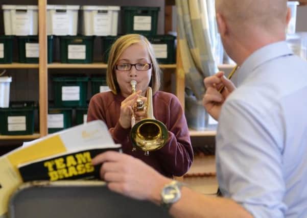 A brass class at Campie Primary School in Musselburgh, East Lothian. Provision for musical instrument tuition in Scotland still depends on where you live. Photograph: Neil Hanna