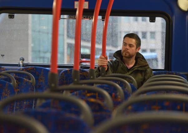 Only about one in ten commuters in Scotland take a bus to work, with two-thirds of employees instead choosing to drive a car or van to their workplace. Photograph: Jon Savage
