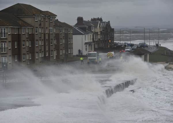Heavy coastal surges and strong winds battered the coast at Troon. Picture: Robert Perry
