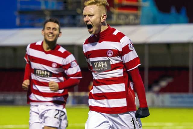Ali Crawford voices his delight after scoring Hamiltons third goal. Picture: SNS