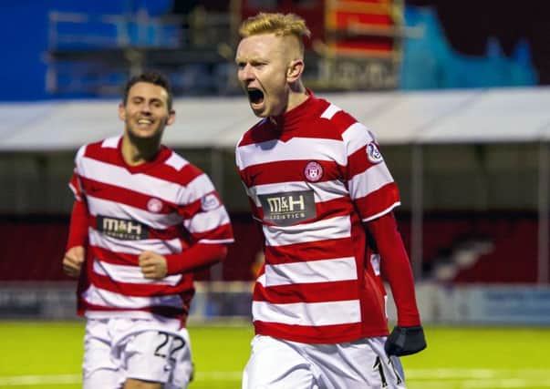 Ali Crawford voices his delight after scoring Hamiltons third goal. Picture: SNS