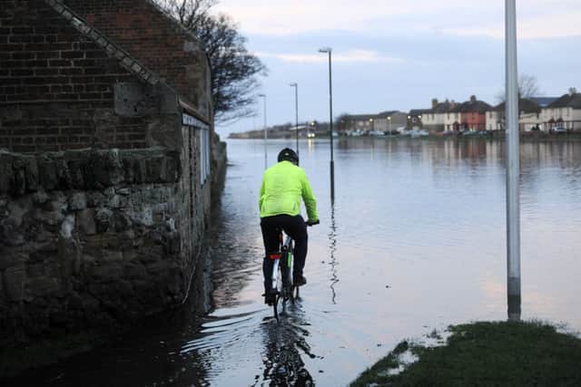 The River Esk bursts it's banks in Musselburgh on Sunday. Picture: Greg Macvean