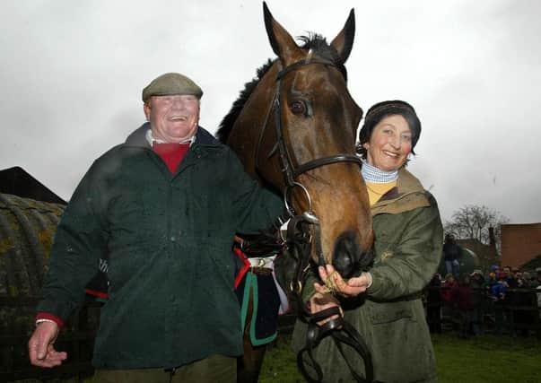 Former champion jockey Terry Biddlecombe and Henrietta Knight with Gold Cup winner, Best Mate. Picture: PA