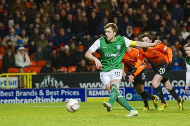 Hibernian's Liam Craig scores from the penalty spot. Picture: SNS