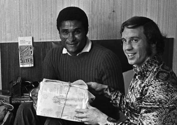 Eusebio meets up with Willie Henderson in Glasgow in 1972. Picture: Eric McCowat