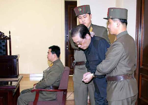 Jang Song-Thaek is escorted to a North Korean court before his execution last month. Picture: Getty