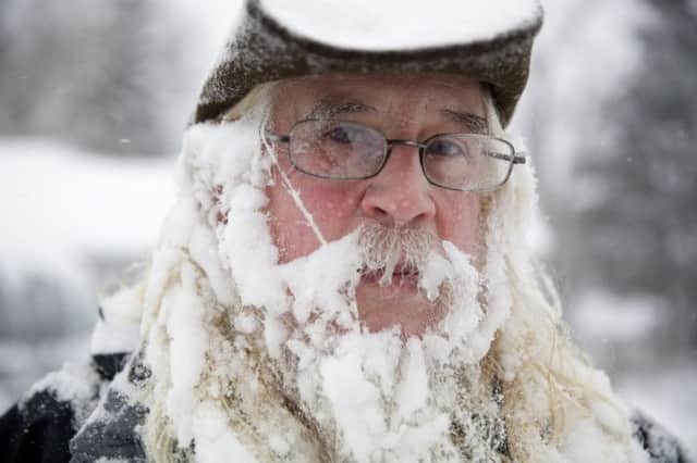 An icy Lee Tuttle, 66, in Flint, Michigan. Picture: AP