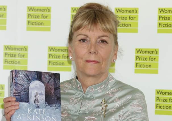 Kate Atkinson with her novel Life After Life. Picture: PA