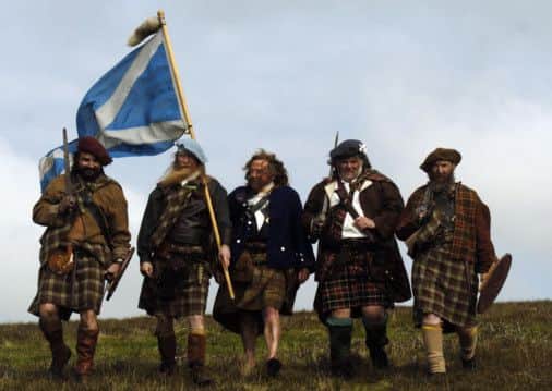 'Jacobite forces' recreate the Battle of Culloden in 2007. A new housing development is to be built near the site of the bloody conflict. Picture: TSPL