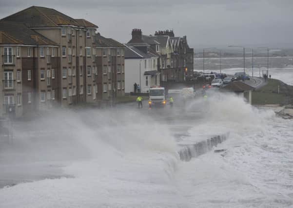 Heavy coastal surges and strong winds battered the coast at Troon last week. Picture: The Scotsman