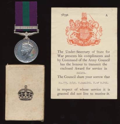 The medal, along with the condolence letter, awarded to the grandfather of Hollywood star Alan Cumming. Picture: HeMedia