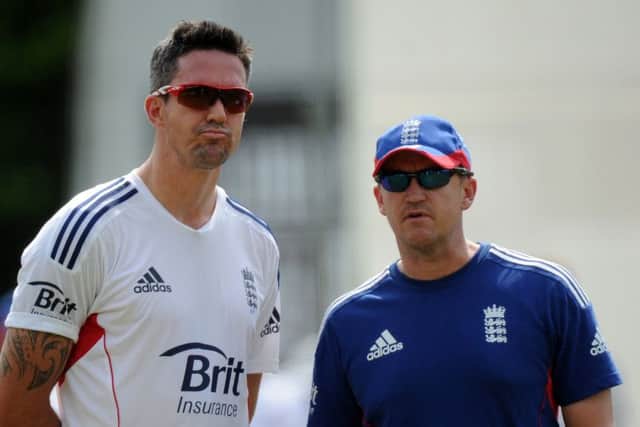 Andy Flower, right, has denied issuing an ultimatum over Kevin Pietersen. Picture: PA
