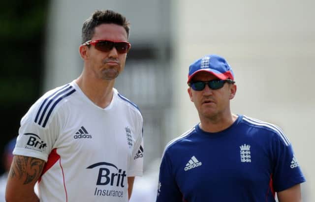 Andy Flower, right, has denied issuing an ultimatum over Kevin Pietersen. Picture: PA
