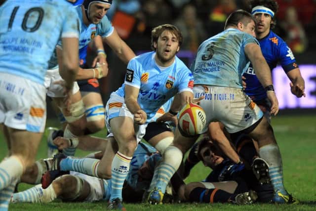 Perpignan scrumhalf Tom Ecochard passes in their match against Bayonne. Picture: AFP