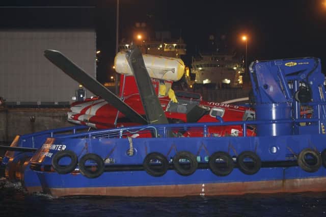 The Super Puma is recovered following the crash in 2009. Picture: Newsline Scotland