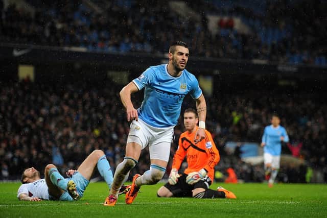 Citys Alvaro Negredo celebrates scoring his sides second goal against West Ham. Picture: PA
