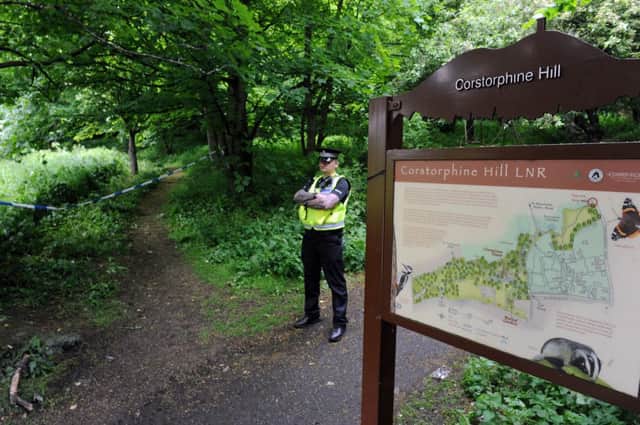 The scene at Corstorphine Hill following the discovery of Mrs Dunleavy's body.  Picture: Ian Rutherford