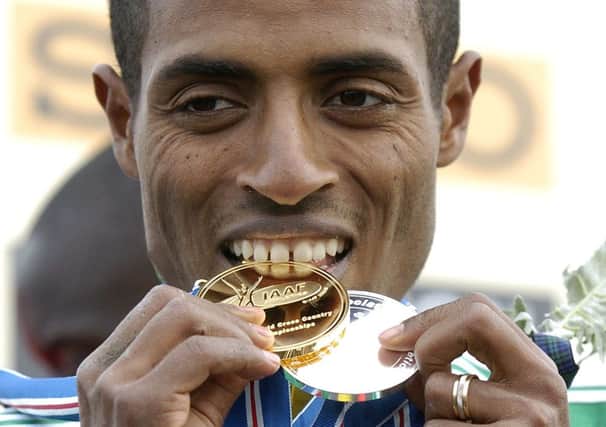 Kenenisa Bekele with his medals from the 2008 World Cross Country at Holyrood Park. Picture: Jane Barlow
