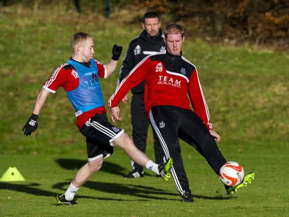Alan Tate is to make his Dons debut against Hibs tonight. Picture: SNS