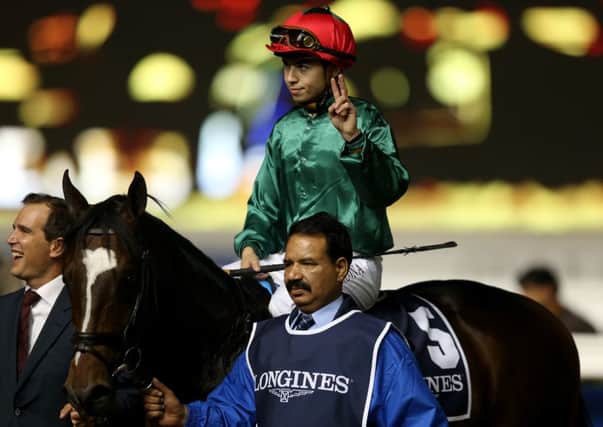 Mickael Barzalona celebrates his win on Fulbright in the Longines Dolce Vita at Meydan. Picture: Getty