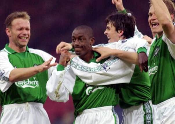 John Hughes and Russell Latapy helped Hibs to the First Division title in season 1998/99. Picture: PA