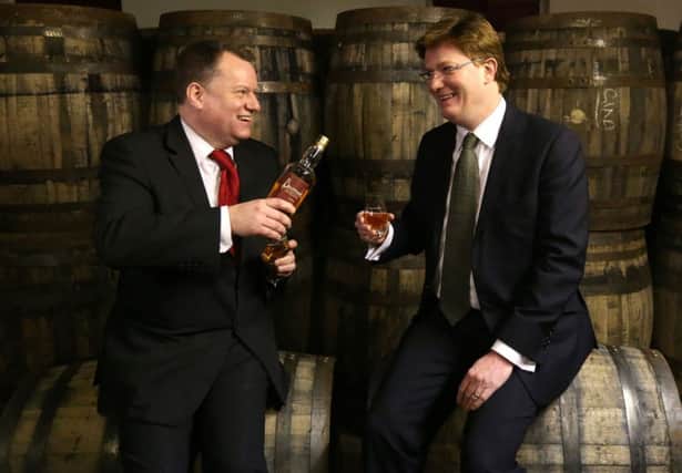 New Scotch Whisky Association Chief David Frost (left) with Danny Alexander. Picture: PA