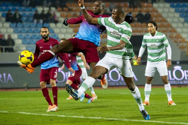 Former Hibs defender Sol Bamba, left, battles with Amido Balde. Picture: SNS