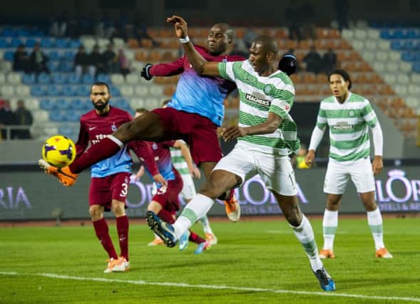 Former Hibs defender Sol Bamba, left, battles with Amido Balde. Picture: SNS