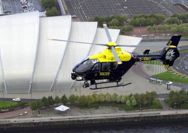 File photo of a Eurocopter-manufactured police helicopter above Glasgow in 2000. Picture: Allan Milligan/TSPL