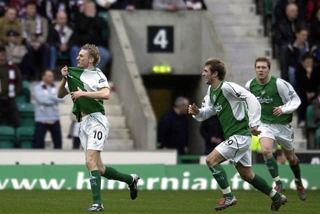 Derek Riordan celebrates with Garry O'Connor close behind. Picture: TSPL