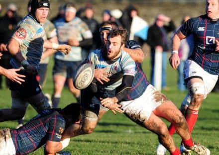 Accies' Sam Pecqueur offloads the ball. Picture: Ian Rutherford