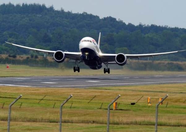 A British Airways Dreamliner takes off from Edinburgh, Scotland's busiest airport. Picture: Ian Rutherford