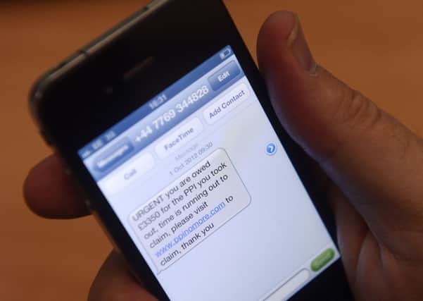Scots are being billed for premium-rate text services despite never signing up. Picture: Phil Wilkinson