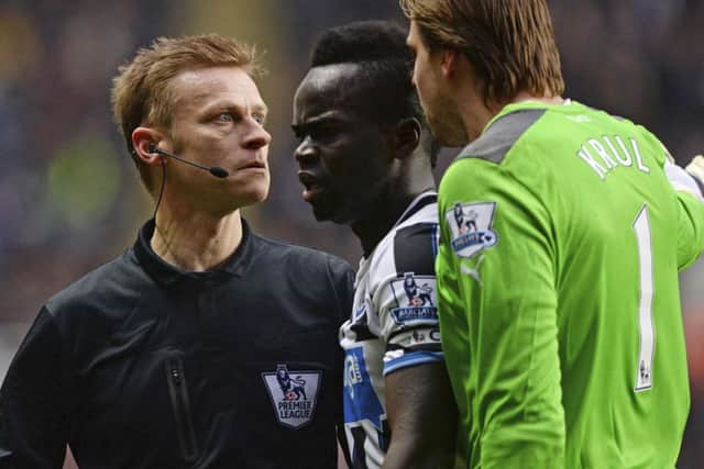 Newcastle goalkeeper Tim Krul angrily confronts referee Mike Jones. Picture: Reuters