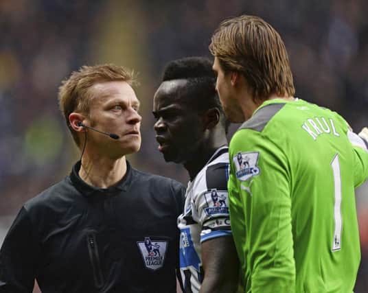 Newcastle goalkeeper Tim Krul angrily confronts referee Mike Jones. Picture: Reuters