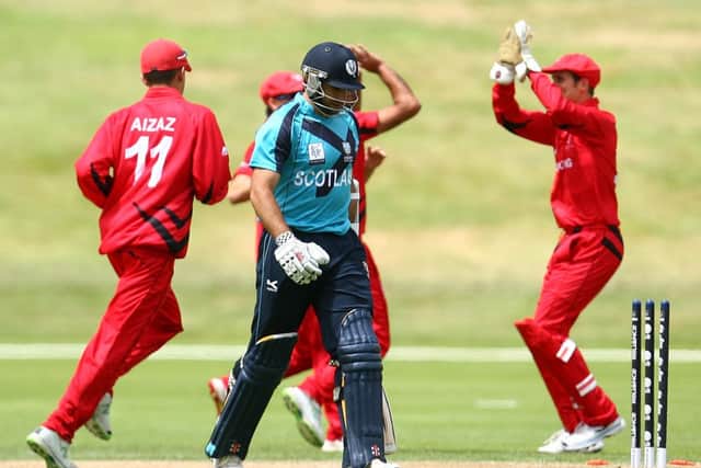 Hong Kong celebrate after their 17-run win over Scotland in Queensland. Picture: Getty